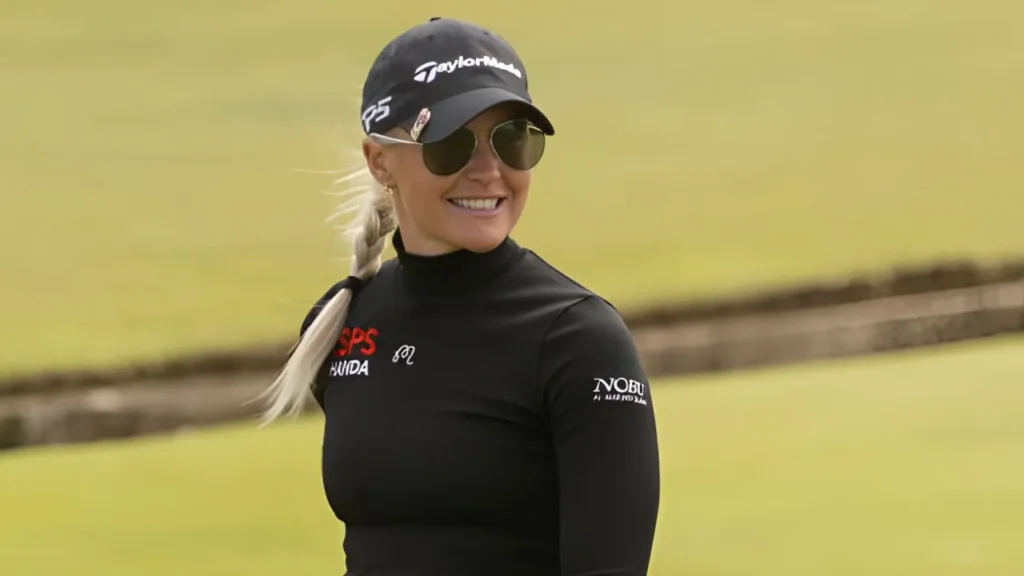 Charley Hulls Smiling in her aviator Glass